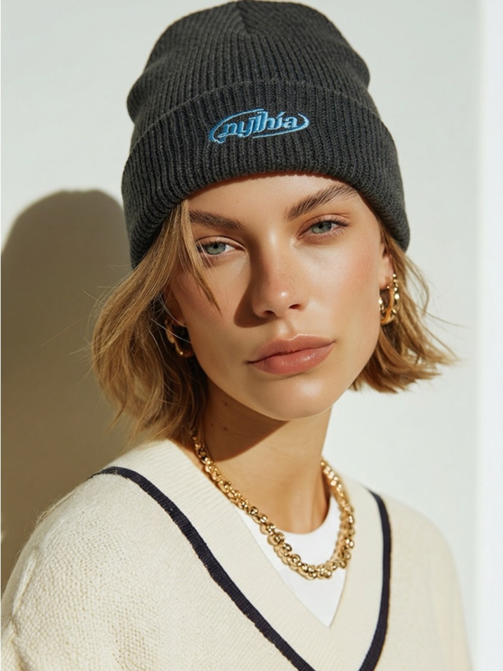 NWOT Pyrhia Unisex Black Knit Beanie with Blue Logo